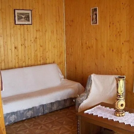 Holiday home Schoenes Holzhaus In *
